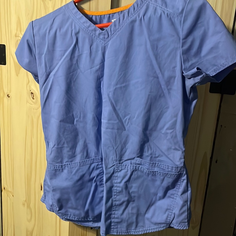 Light blue scrubs, star size small, scrub top